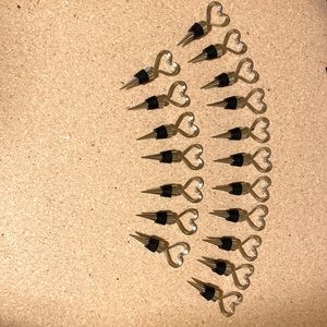 18 - Heart shaped wine bottle stoppers.